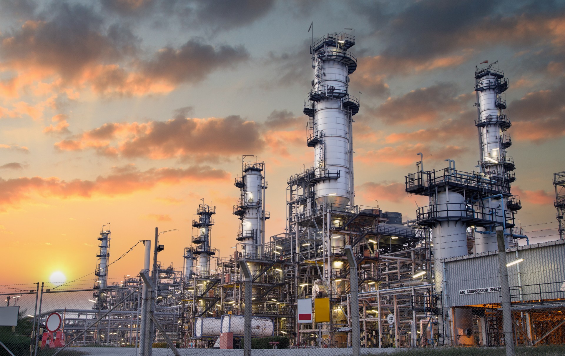 Oil and Gas Industrial zone,The equipment of oil refining,Close-up of industrial pipelines of an oil-refinery plant,Detail of oil pipeline with valves in large oil refinery.